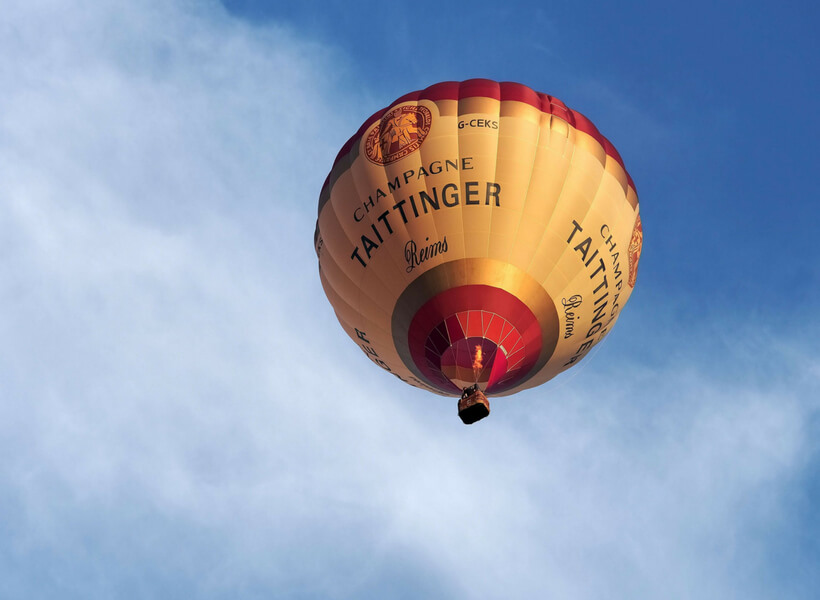 Hot air balloon in the sky with the inscription 