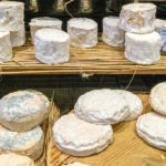 Cheese display at a cheese specialty store in France