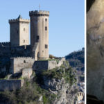 the castle in foix: medieval castle on top of a hill