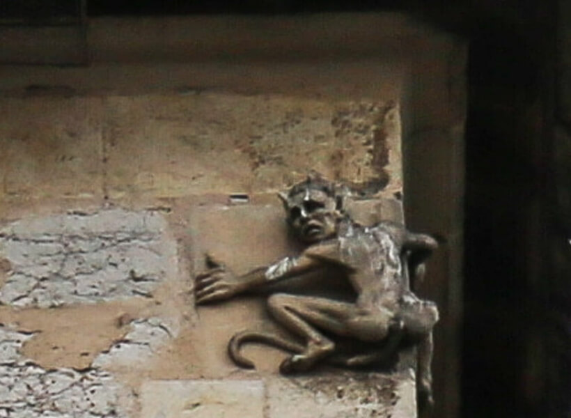 the devil carved on the valentré bridge in Cahors, France