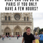 man goofing around in front of Notre Dame pretending to be the huchback: layover in paris episode