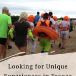 runners at the Medoc marathon running with funny costumes