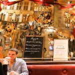 people talking in a restaurant in Paris