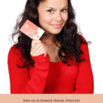 woman holding a credit card: will my credit card work in france episode