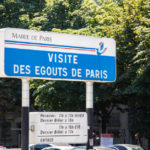 paris sewer sign near its entrance