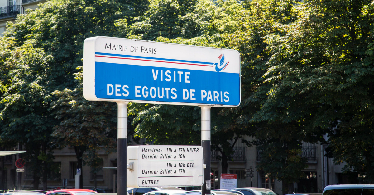 paris sewer sign near its entrance