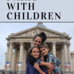 boy and girl in front of the Patheon in Paris with their mother