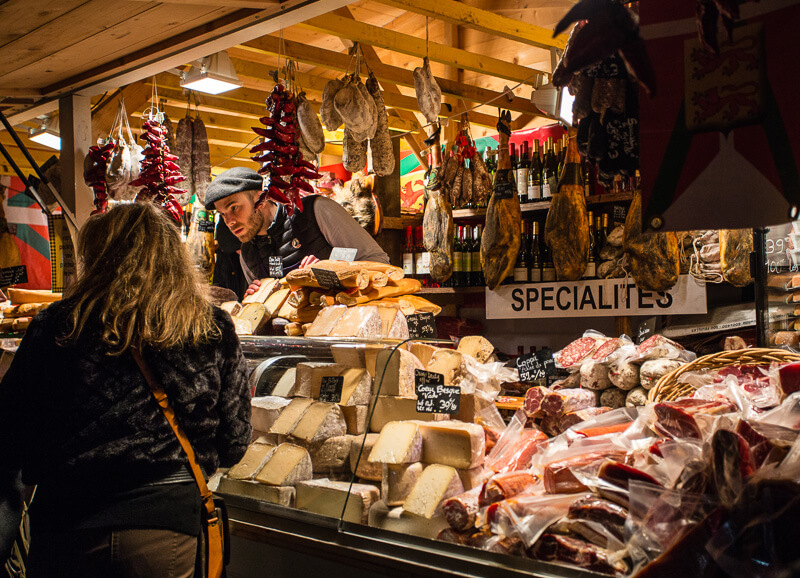 ham and saussage vendor at the Paris Christmas Market