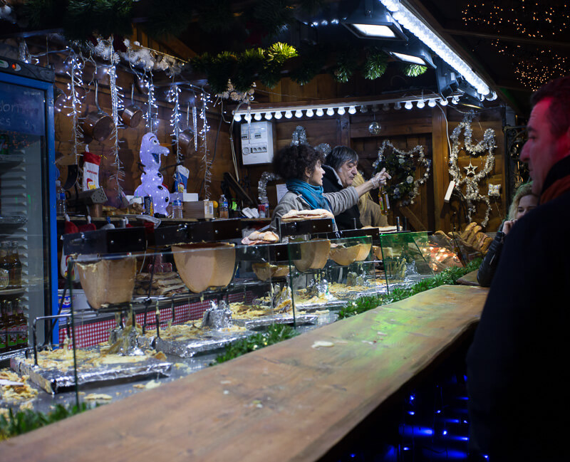 raclette vendor at the Paris Christmas Market