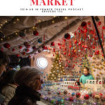 Woman selling Christmas ornaments at the Paris Christmas Market