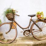 Tour the south west of france, ornamental bicycle against a wall