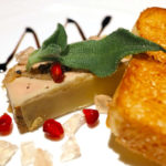 foie gras platter with red berries, mint and a sweet garnish
