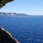 rocky cave with view on the blue mediterranean in corsica