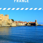 blue sea and the iconic port entrance in Collioure, France