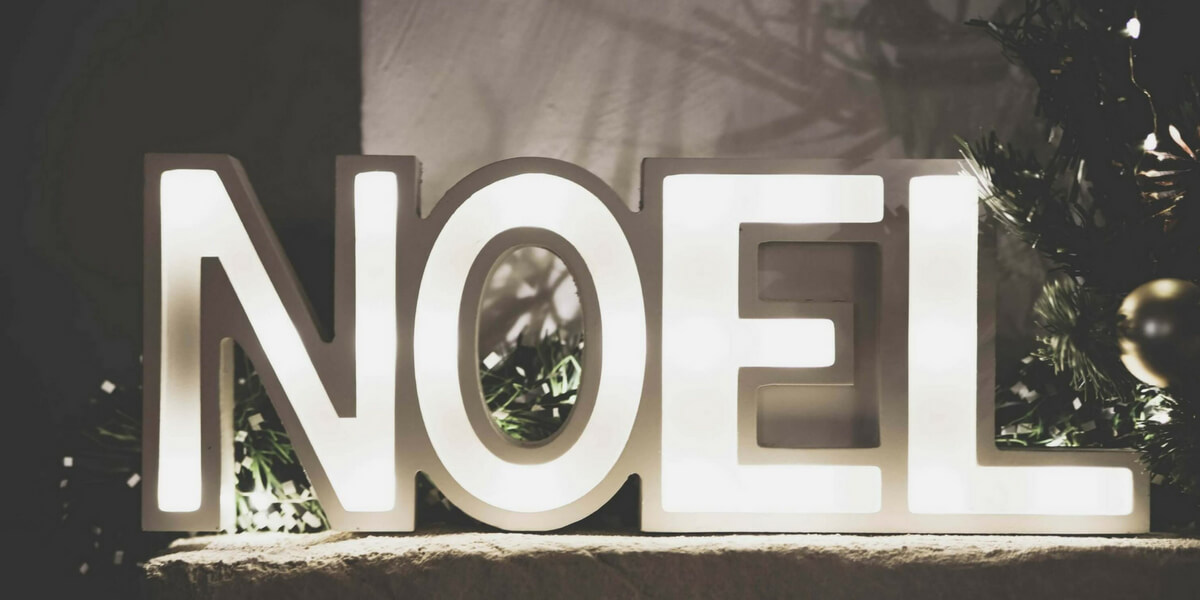 Sign that says "Noël" which means Christmas in French. Christmas in france episode.