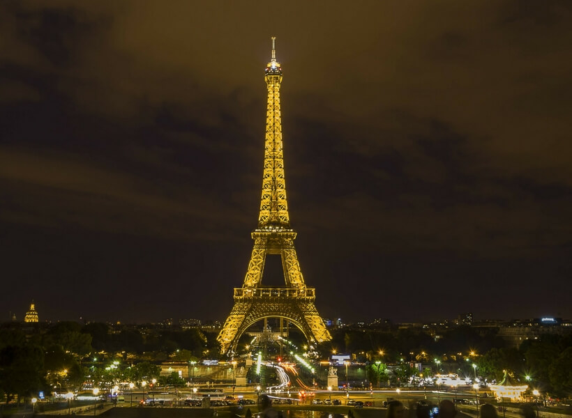 The Eiffel Tower seen from the Trocadero at night; first time in Paris