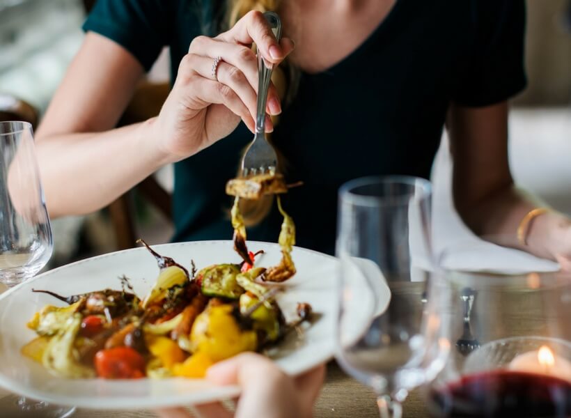 woman eating a meal; table manners in france