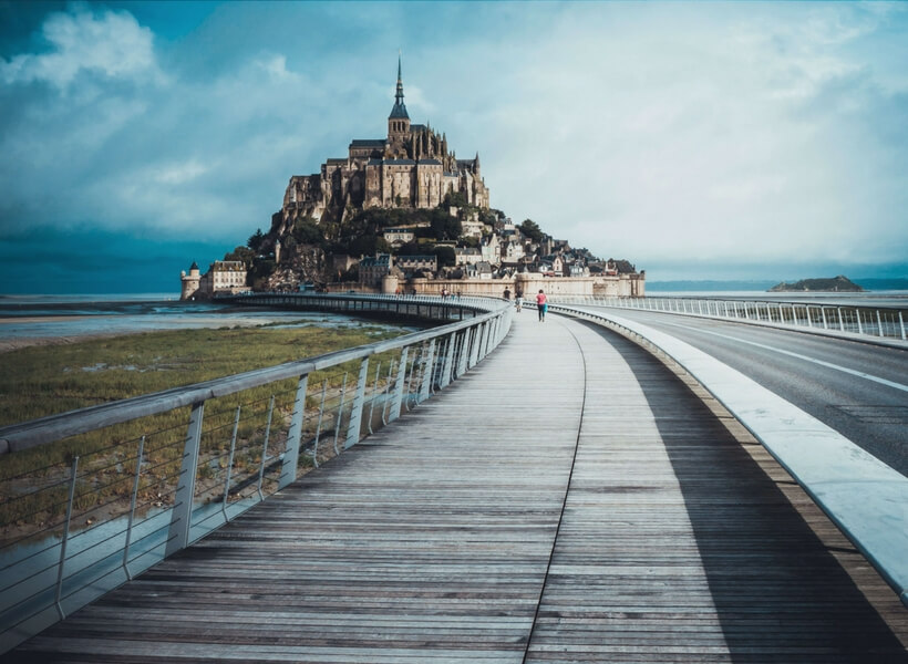 boardwalk that leads to the mont saint michel