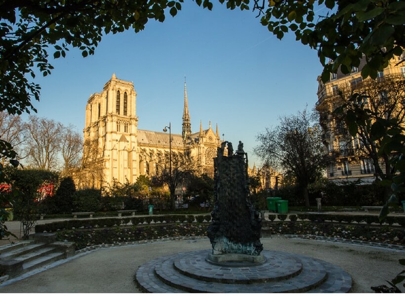 notre dame cathedral seen from a distance; how to do a layover in paris on your own