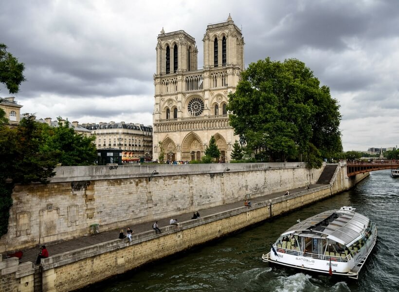 notre dame cathedral seen from the river; paris highlights