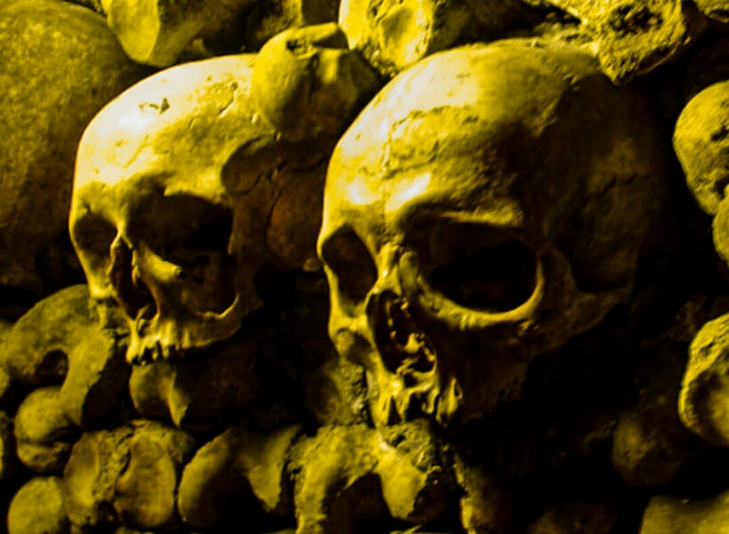 skulls in the catacombs; paris highlights