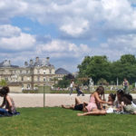 people having a picnic in paris at the Luxembourg Gardens