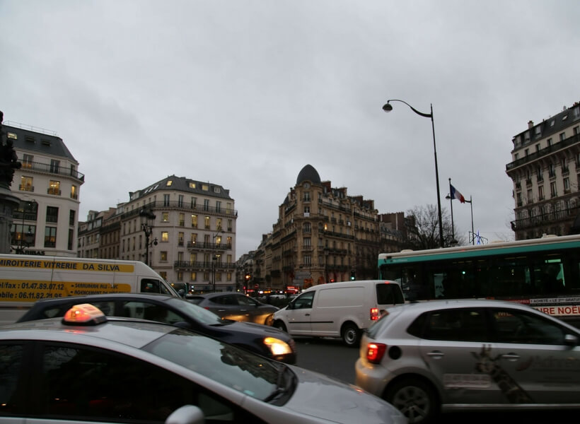 messy traffic in Paris with cars going in every direction; What Is It Like Driving in France