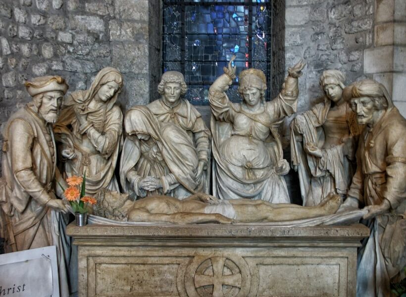 sculpture showing the burial of Jesus inside of the Reims Cathedral; day trip to Reims from Paris