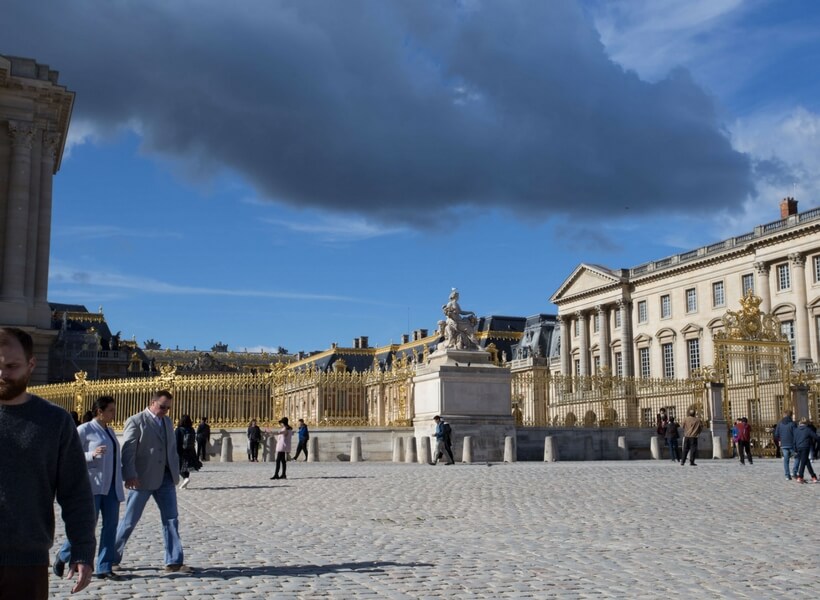 a view of the Versailles courtyard; day trip to versailles from paris