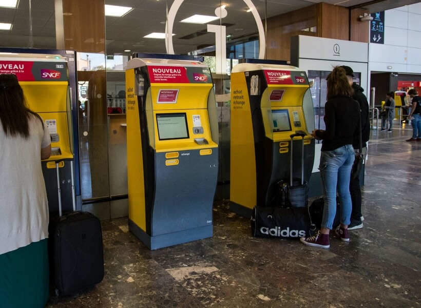 sncf ticket machines at a train station in france