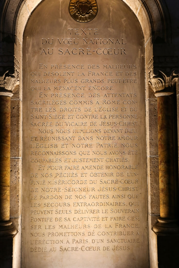 Mission statement written in stone inside of the Sacré Coeur Basilica in Paris