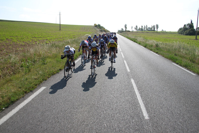 group of riders in the french countryside