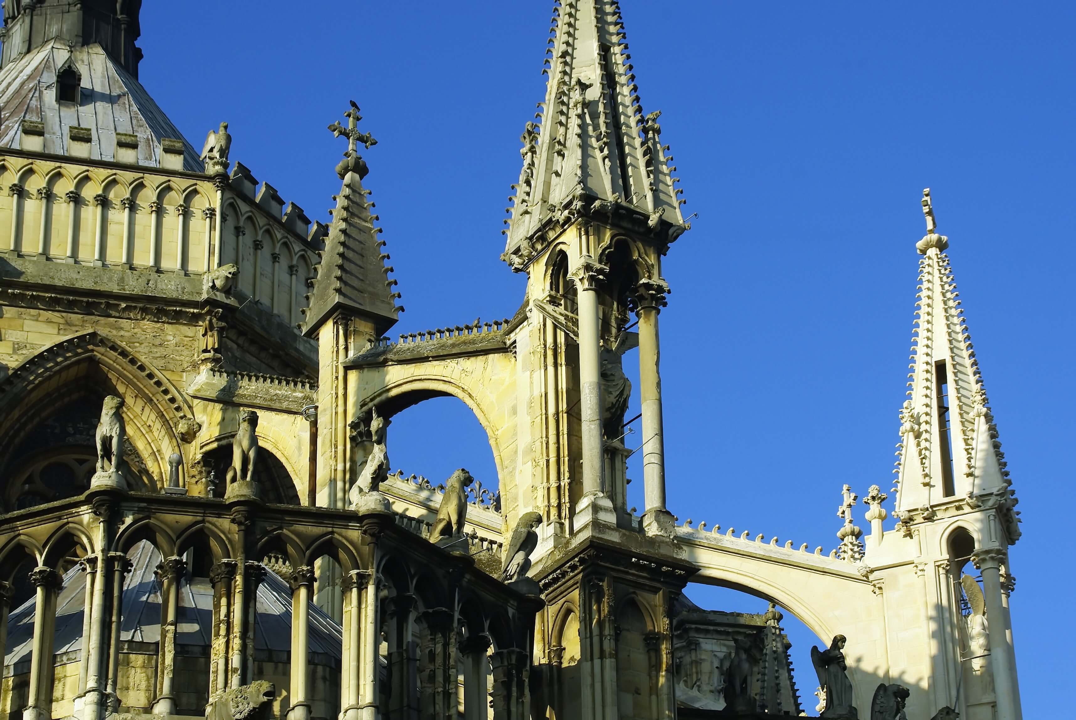 flying buttresses at the Reims Cathedral; day trip to Reims from Paris