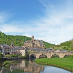 the city of Estaing in the Aveyron: river and medieval bridge