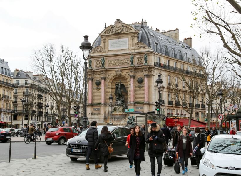 people walking in Paris wearing winter attire