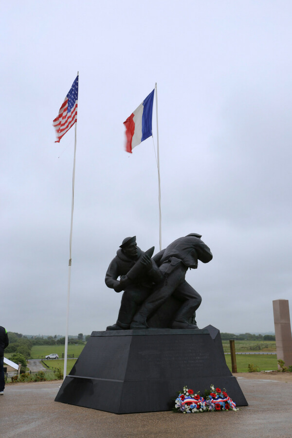 Statue of soldiers charging canons at Pointe-du-Hoc