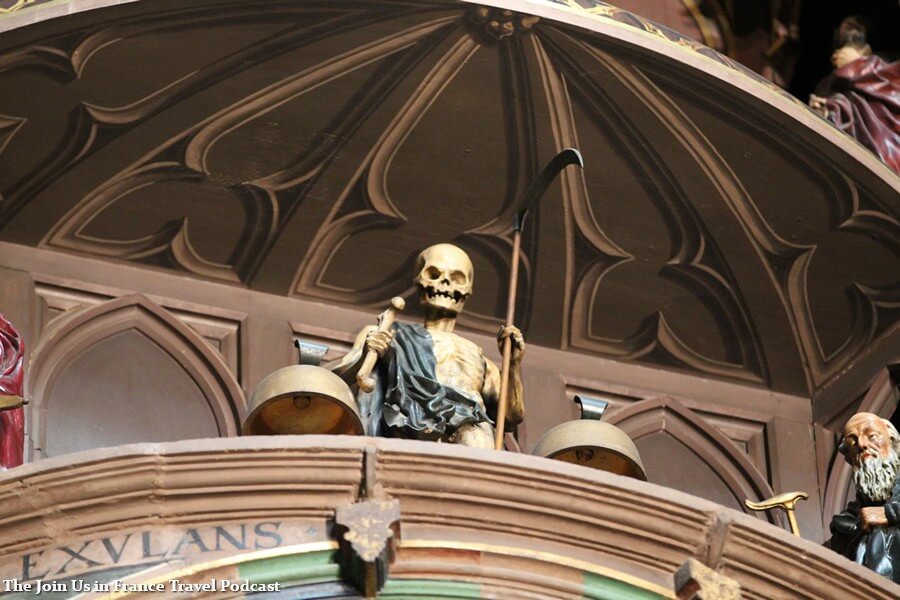 Detail inside of the Strasbourg Cathedral, death holding its scythe