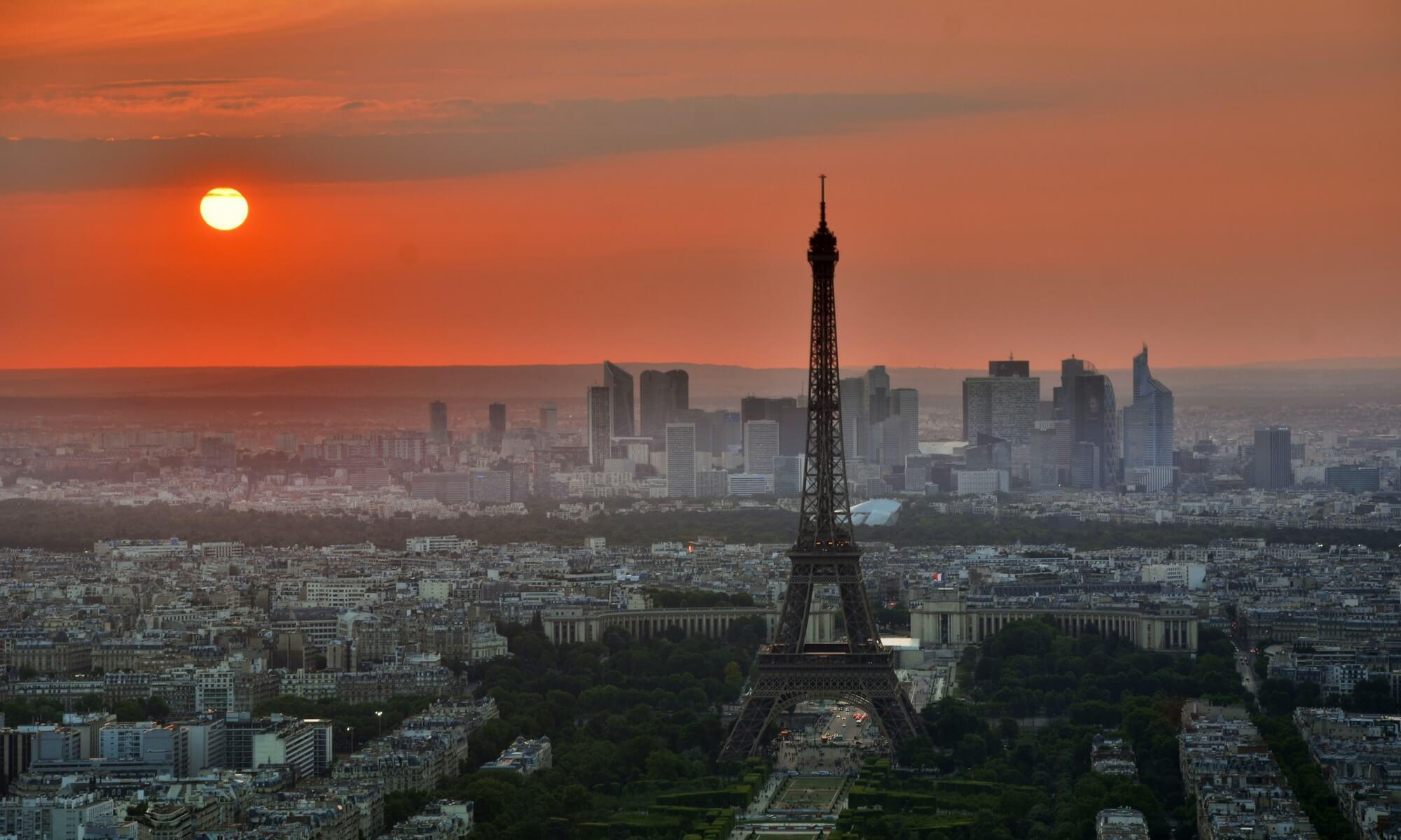 sunset over paris with red sky