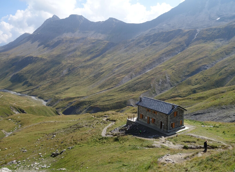 mountain chalet seemn from up above in the distance