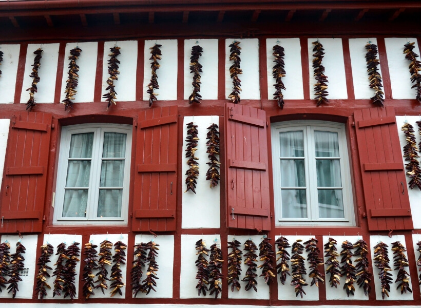 espelette peppers hung on the front of a house: exploration of the basque country show notes