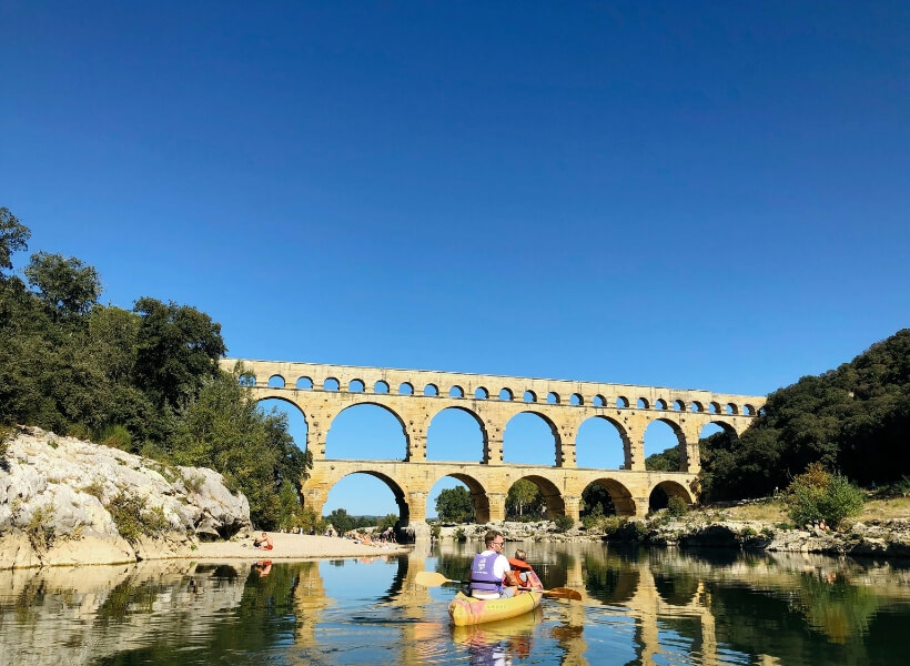 kayak about to go under the pont du gard taken with an iphone: vacation photos