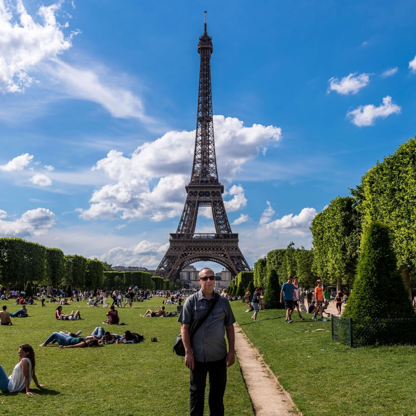 Scott standing in front of the Eiffel Tower: 4 days in Paris episode