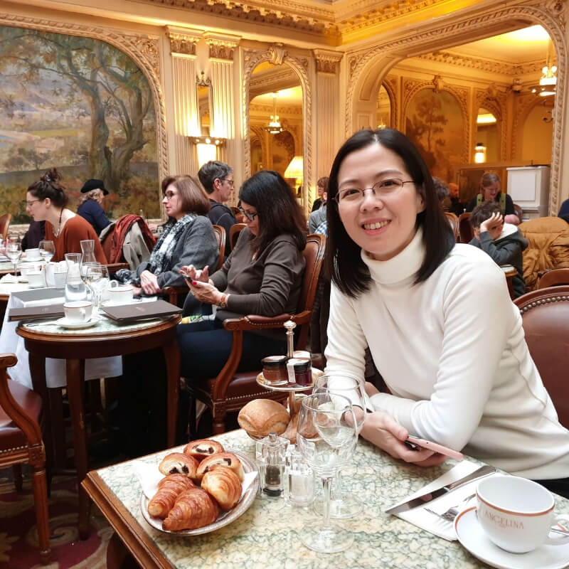 Eric's wife at Angelina's on rue de Rivoli in Paris