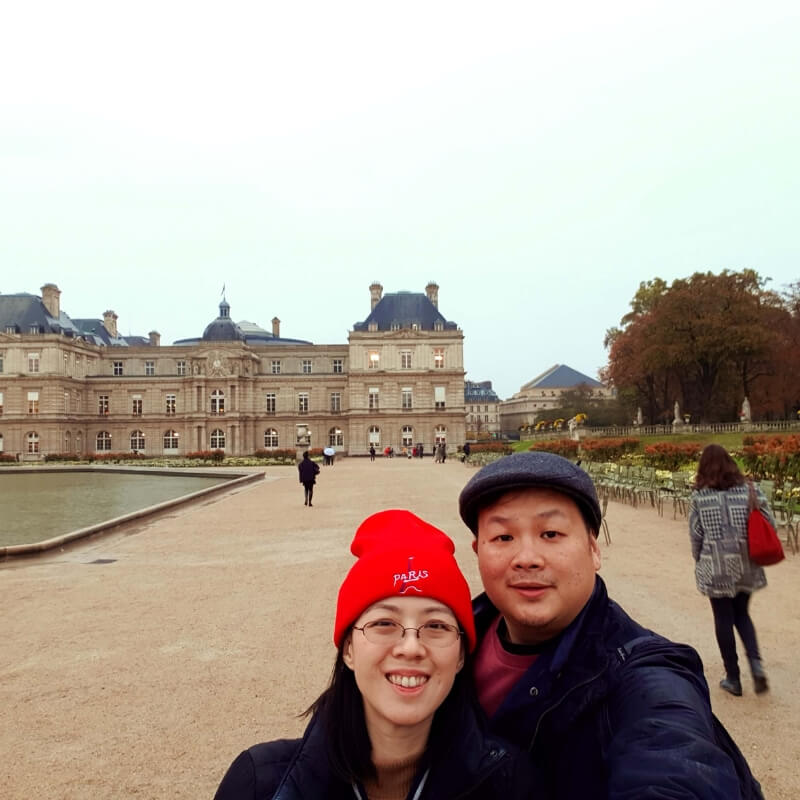 Eric and his wife at Versailles enjoying the gardens