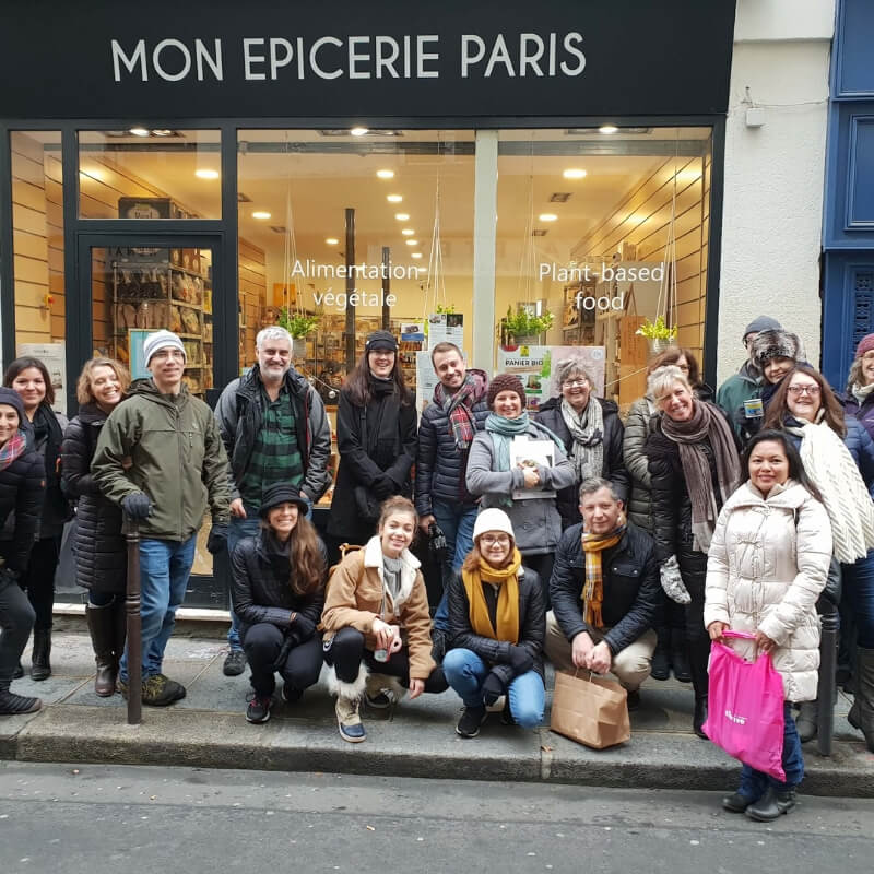 Brigdhe's goup in front of Mon Épicerie Paris: Vegans Visiting France episode