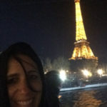 Corrie with lit-up Eiffel Tower in the background