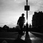 man walking in paris black and white: paris street photography episode