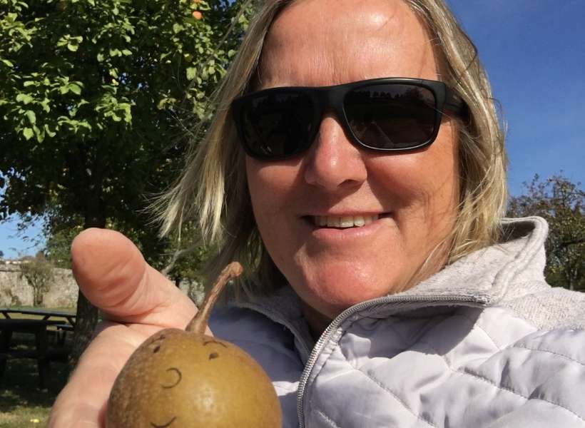 My guest Ria Windcaller holding a cider apple