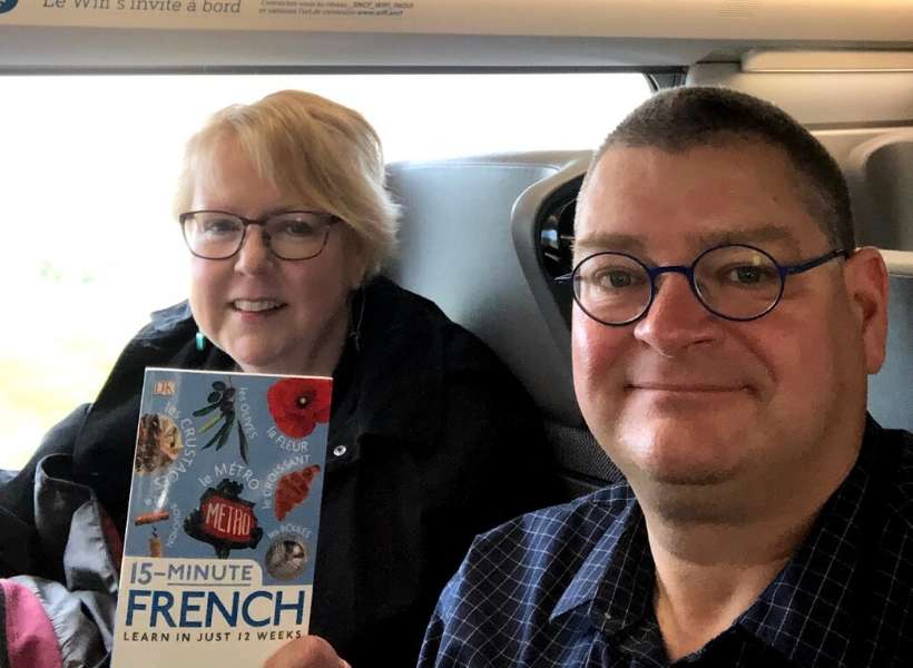 Matthew and his wife Laurie in an airplane: Toulouse trip report episode