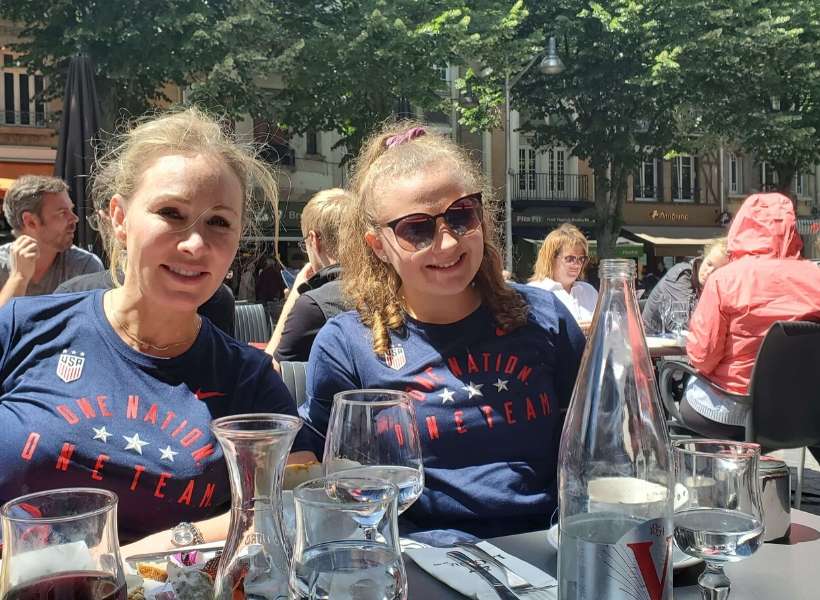 Kimberly and one of her daughters in front of the Mont Saint Michel: Women World Cup Trip Report episode